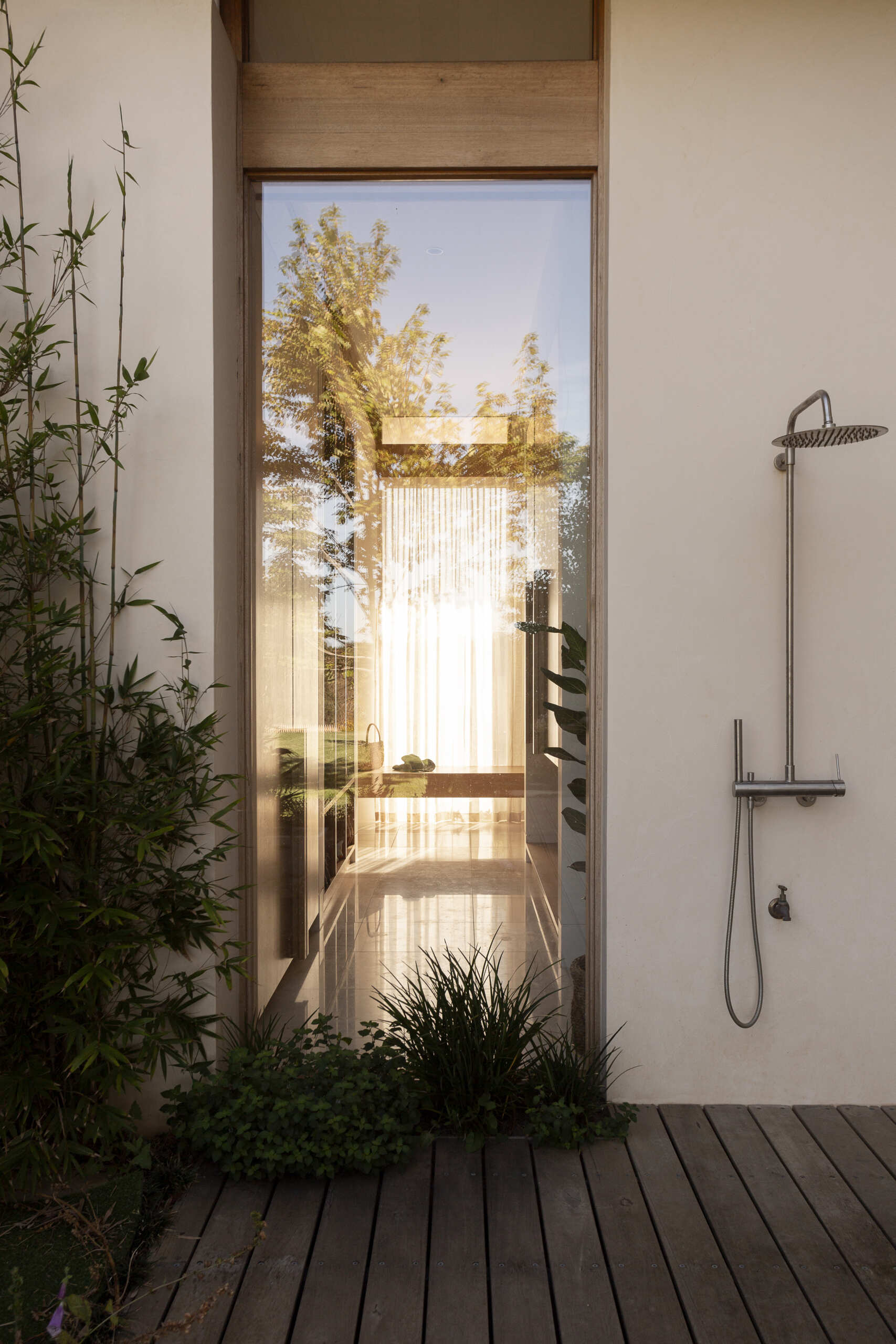A modern home with an outdoor shower.