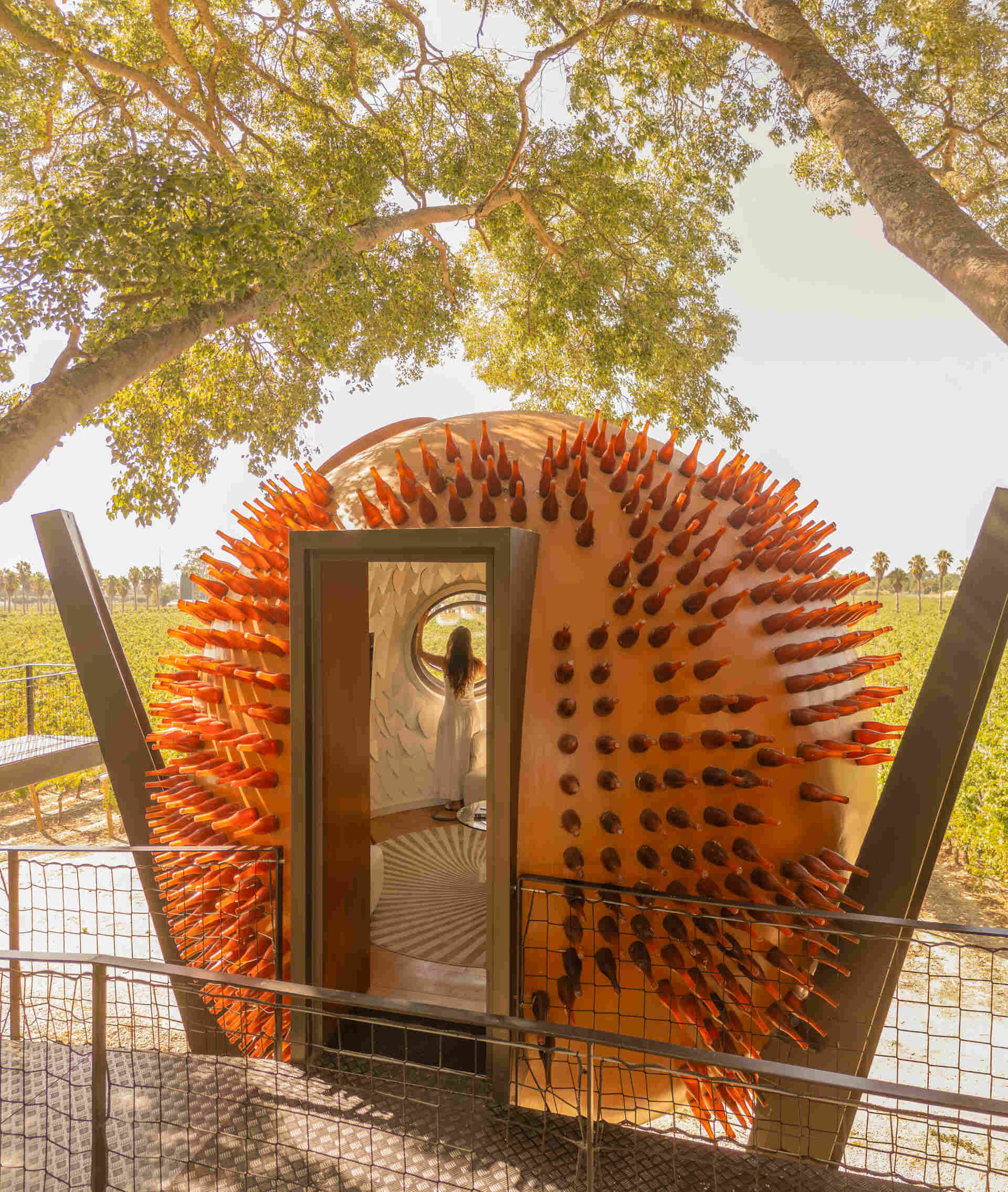 Discover ÁTOMOS by Rebelo de Andrade Studio in Setúbal, Portugal, where three sculptural spheres, recycled glass, and vineyard landscapes combine in an unforgettable architectural experience.