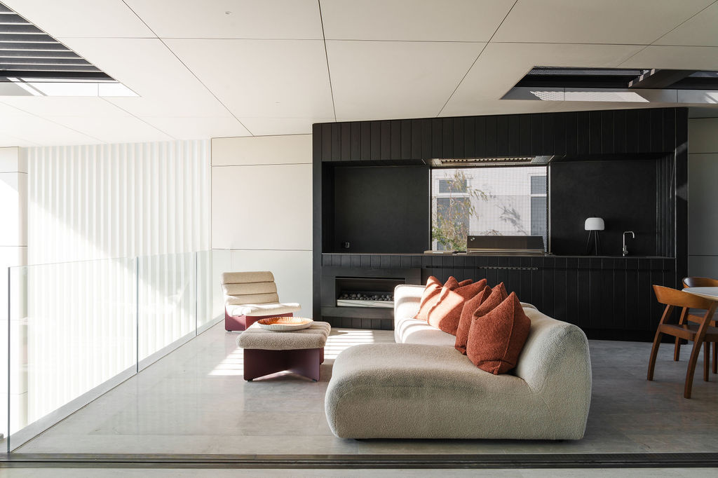 The mezzanine at Mezzanine House provides a flexible one-bedroom apartment designed for visiting family and future changes in the family's needs.
