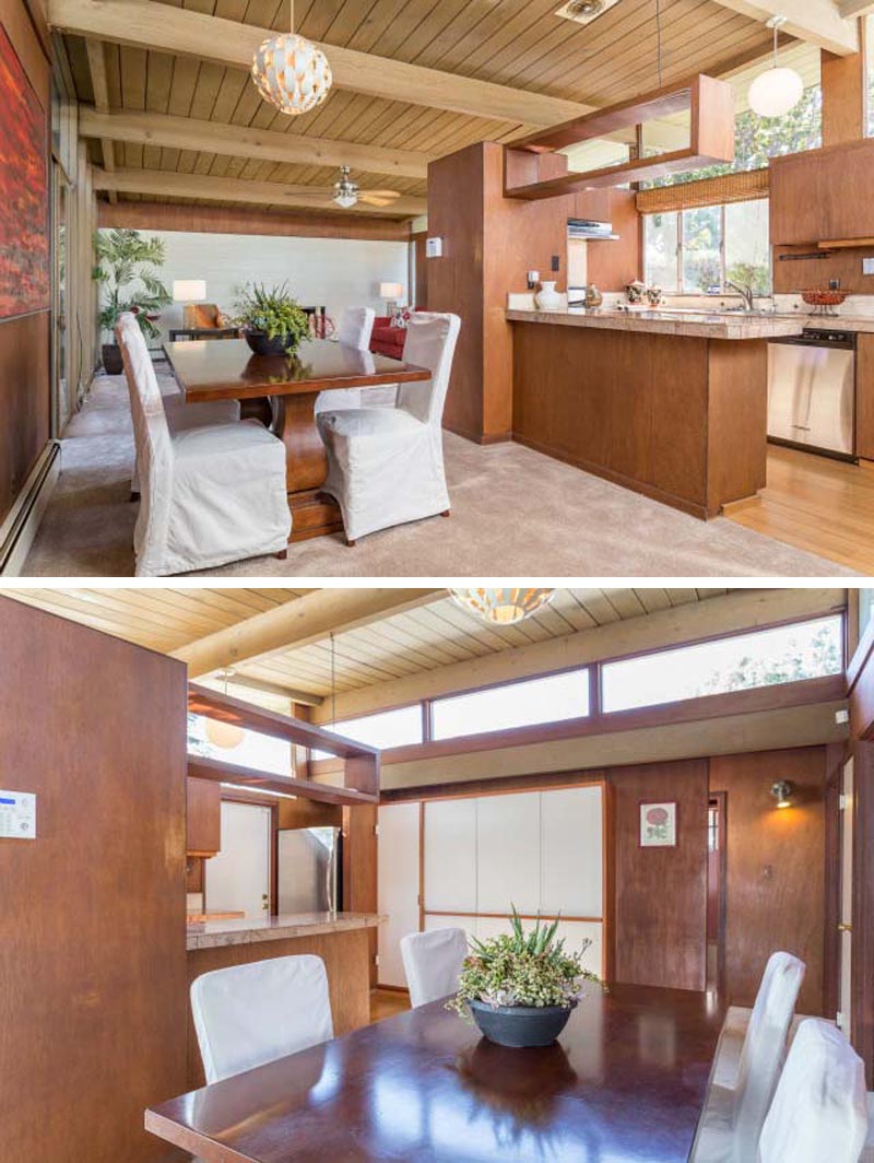 BEFORE - The kitchen wood was restored, while a simple dark grey countertop and black fixtures were added. The darker elements provide a contrast that helps the wood stand out.