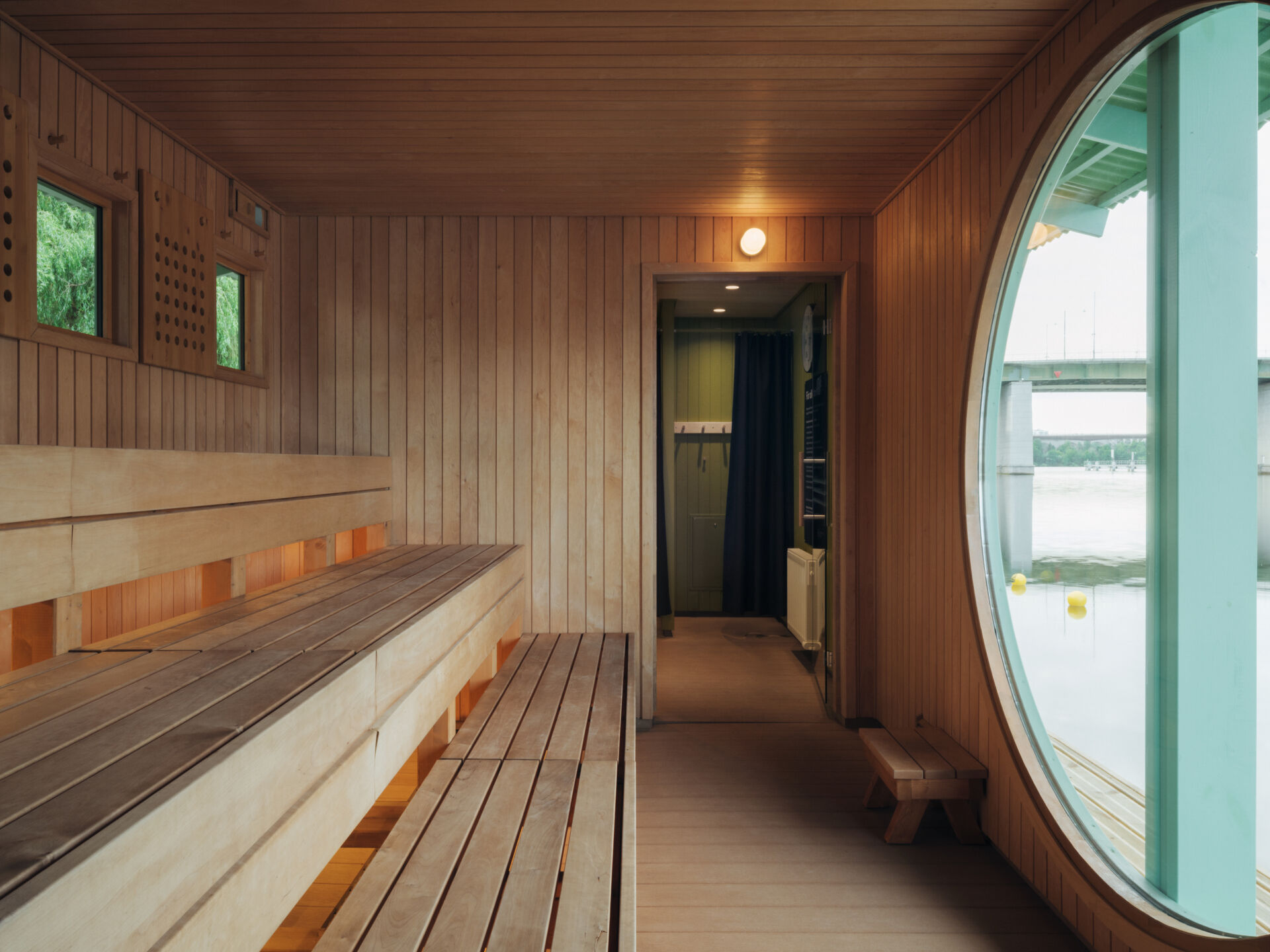 DinellJohansson’s floating sauna at Hornstull pairs a verdigris-green exterior with a public pier and pergola, creating a new waterfront gathering place for up to 16 visitors.