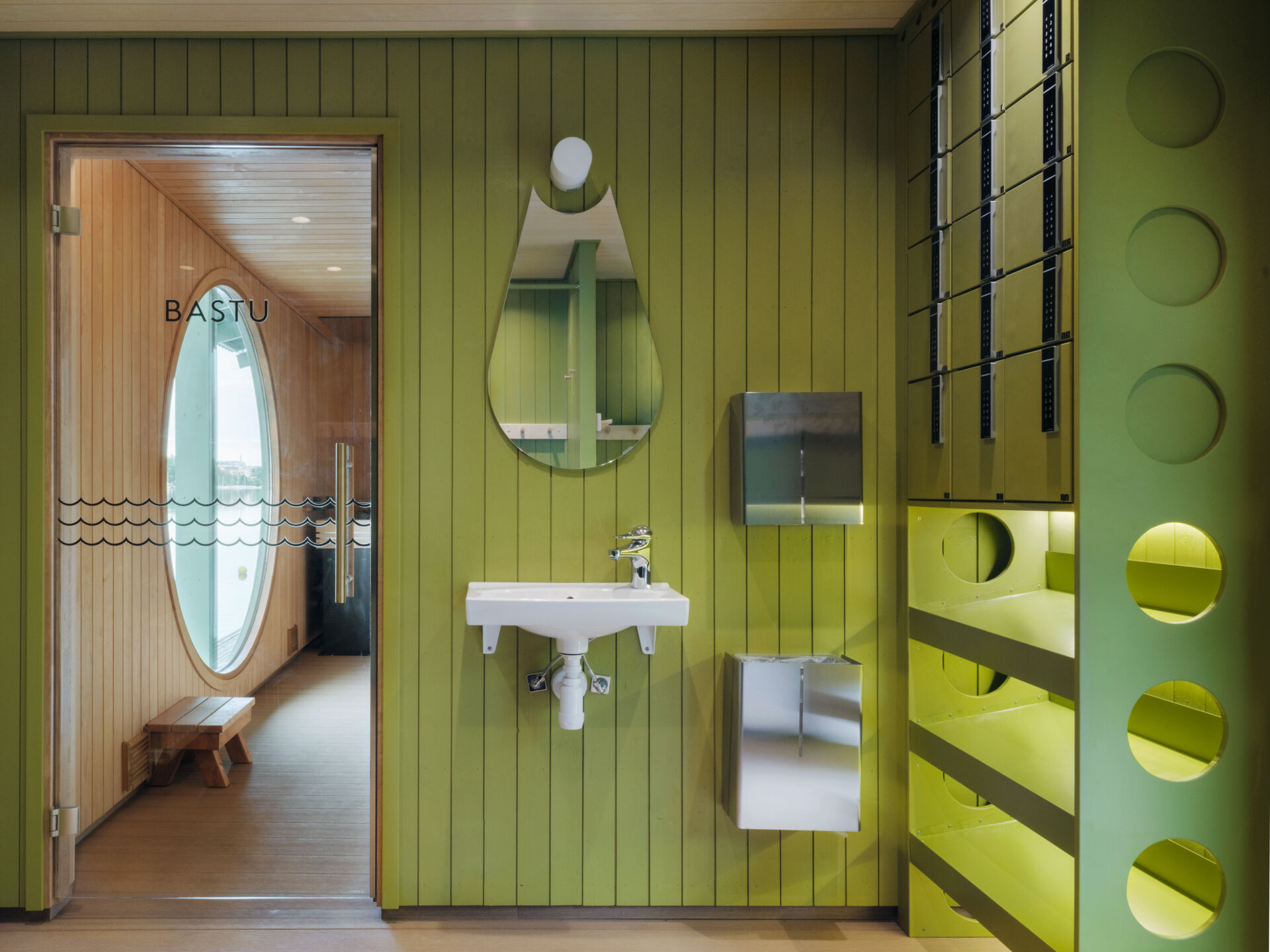 DinellJohansson’s floating sauna at Hornstull pairs a verdigris-green exterior with a public pier and pergola, creating a new waterfront gathering place for up to 16 visitors.