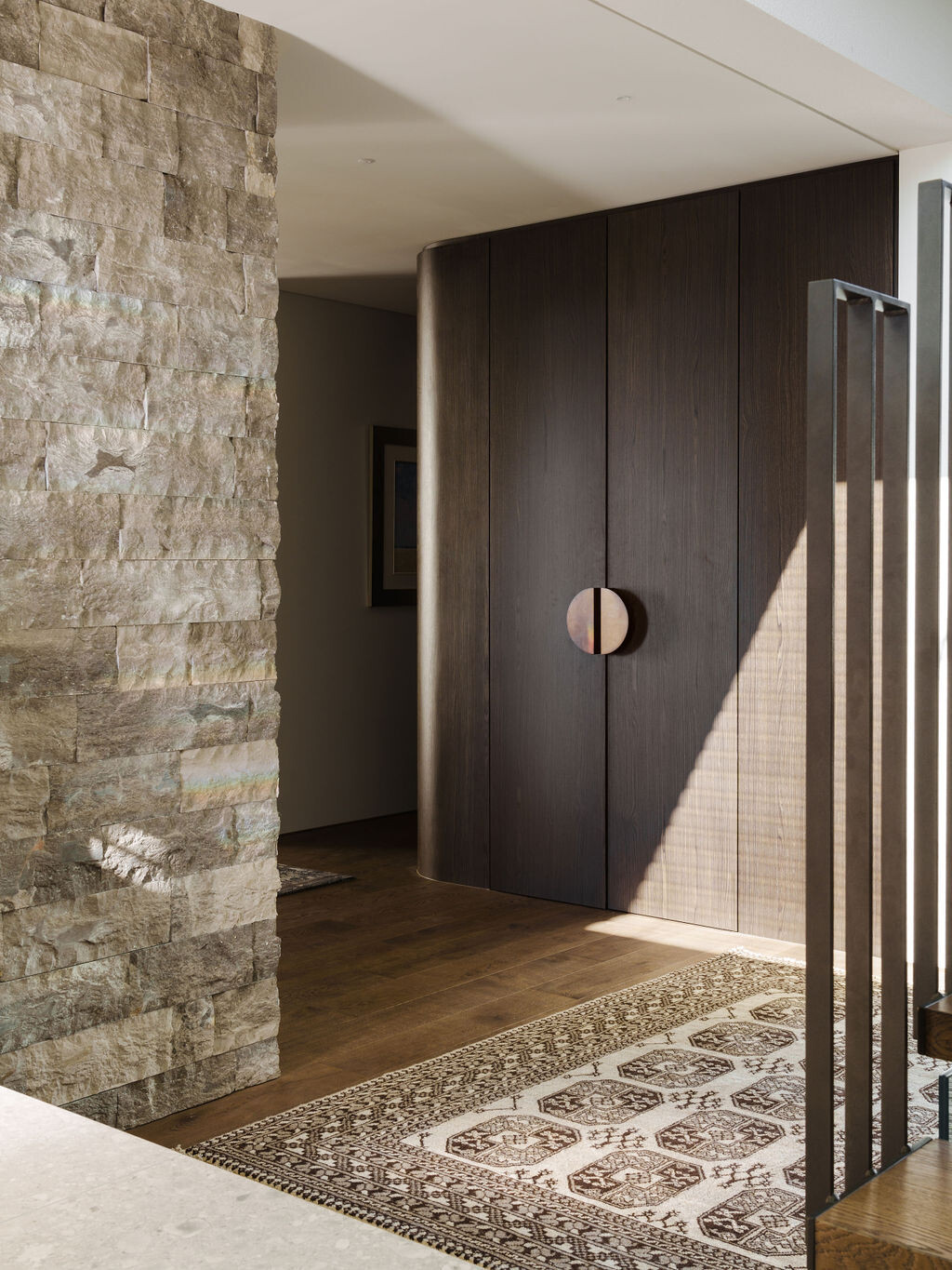 Step inside the foyer of Mezzanine House in Perth, where concrete, timber and natural light introduce the contemporary material palette of this family home.
