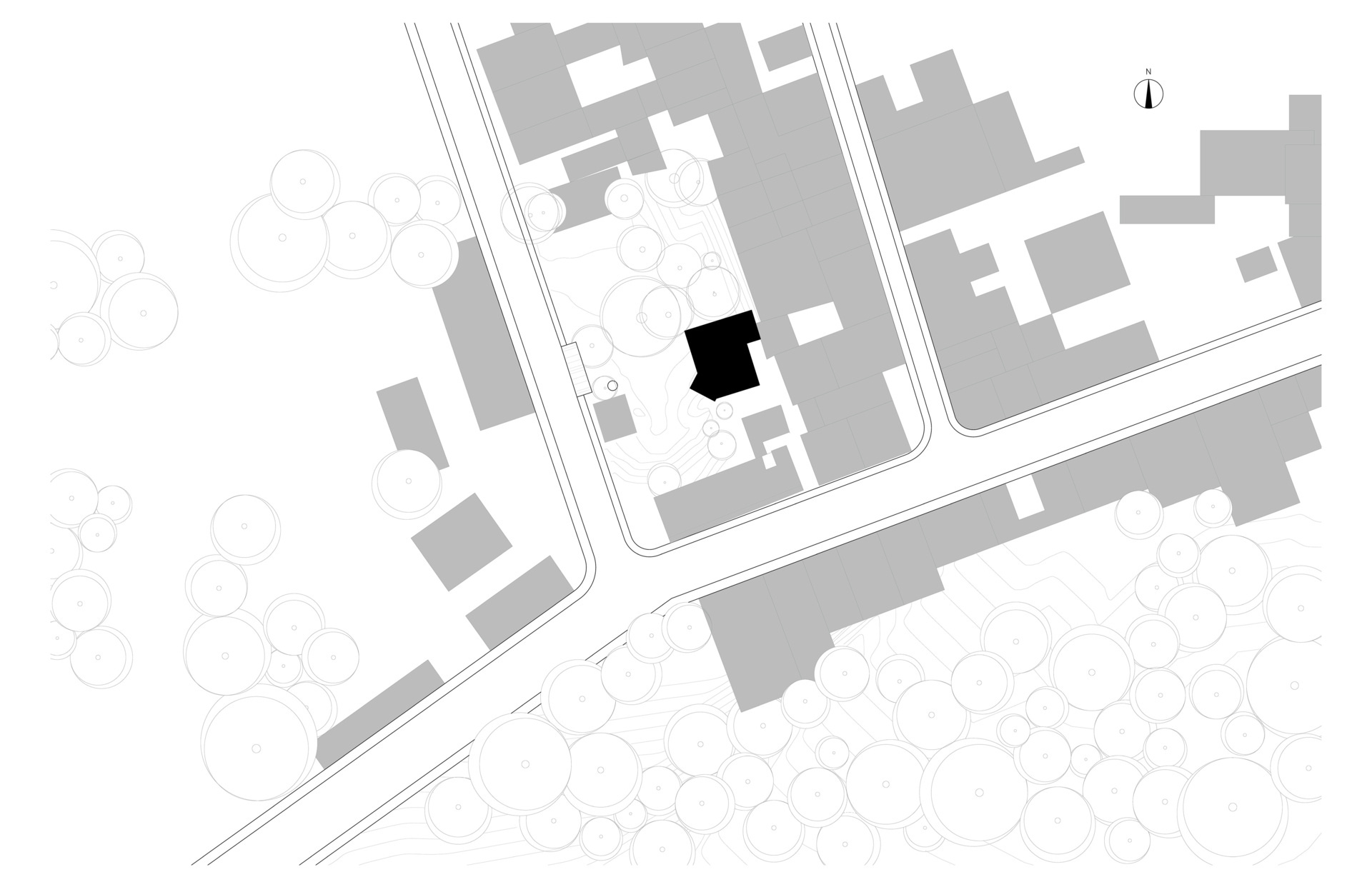 See the architectural drawings for Casa Amona, showing how its two-level house, separate workshop and tree-filled courtyard fit together on an urban plot in Chiapas.