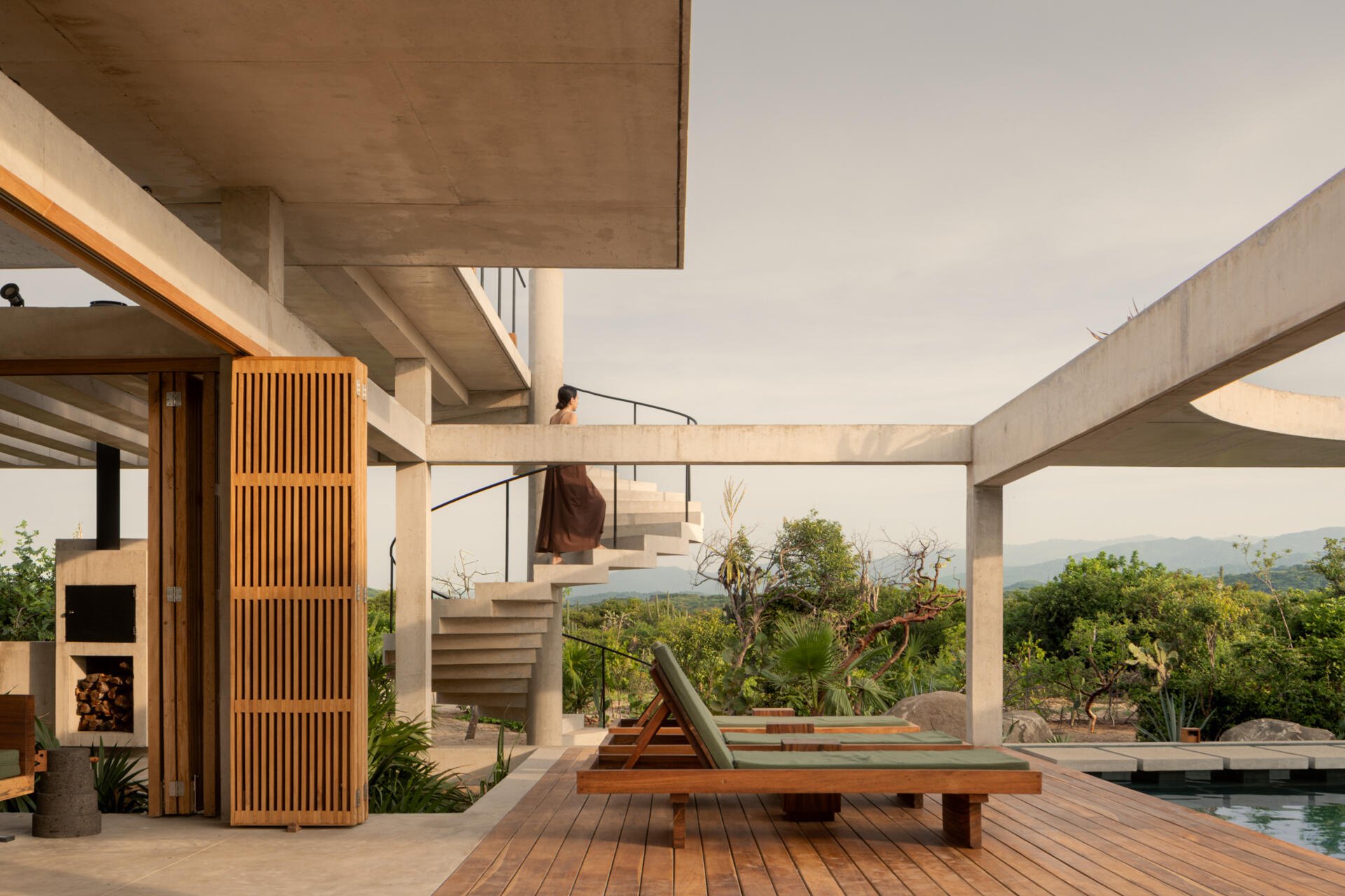 A planted rooftop extends Casa Cieno beyond its main living spaces, offering views toward the sea and Oaxacan mountains while returning greenery to the site.