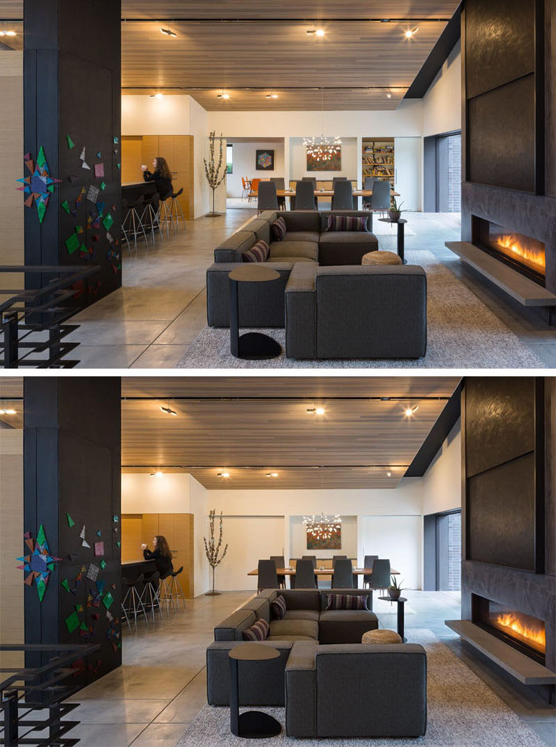 The living room flows into the dining room and kitchen, creating one large open interior. When more separation is needed, large sliding doors can close off the den and playroom, allowing these areas to function independently.