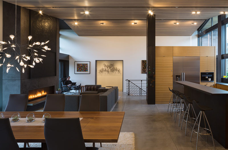 Off the living room, a hallway leads through to the bedrooms, bathrooms and laundry room. The layout creates a transition from the open entertaining spaces at the front of the plan to the more private rooms further inside the home.