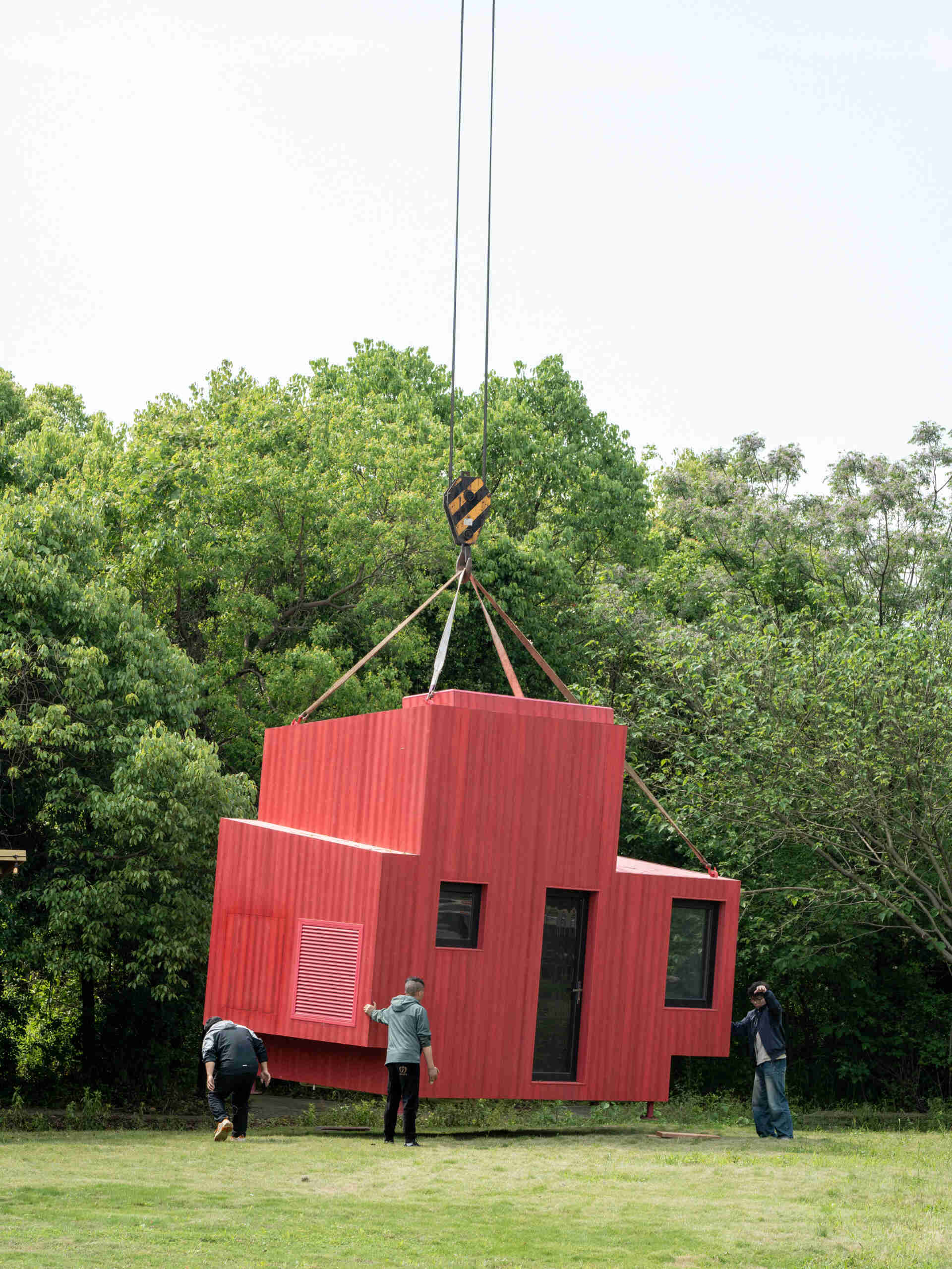 Wiki World’s modular forest cabins are elevated above the ground and assembled from prefabricated timber components, creating a Lego-like approach to woodland architecture.