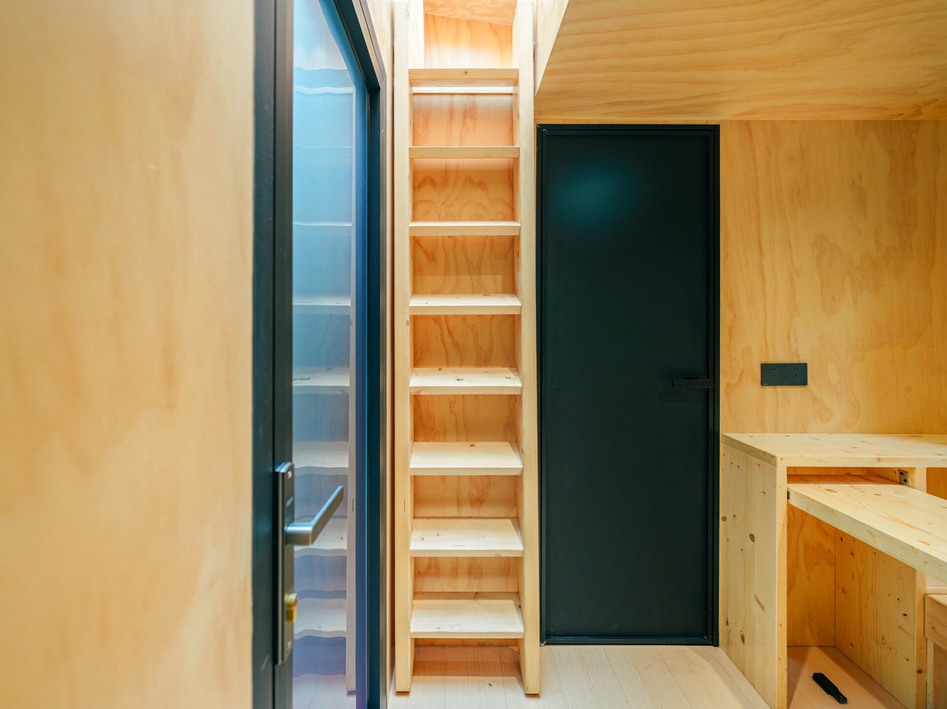 Step inside Wiki World’s Red Submarine Cabin, where circular portholes, panoramic windows and forest views create the feeling of sailing through the trees.