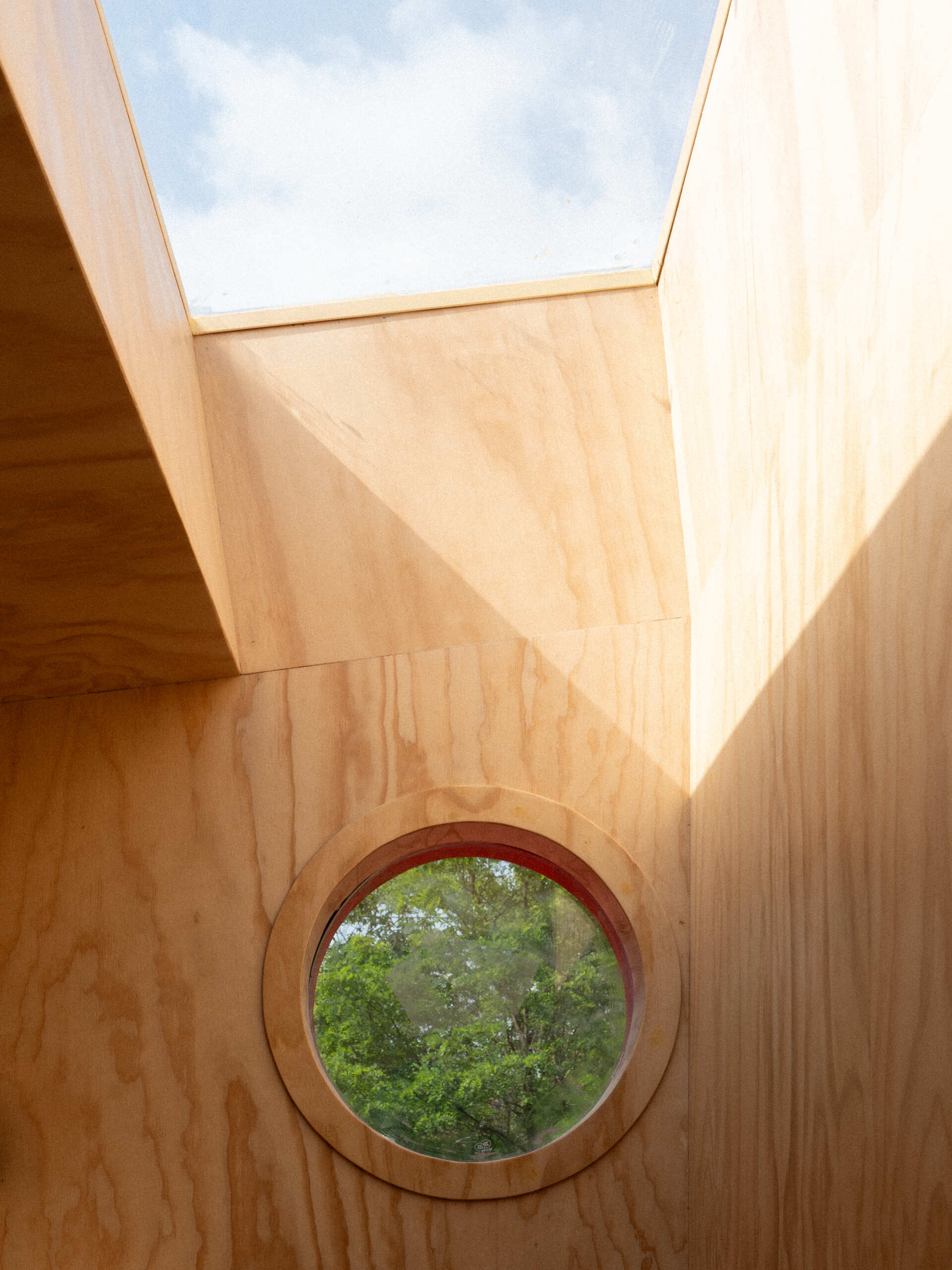 Step inside Wiki World’s Red Submarine Cabin, where circular portholes, panoramic windows and forest views create the feeling of sailing through the trees.