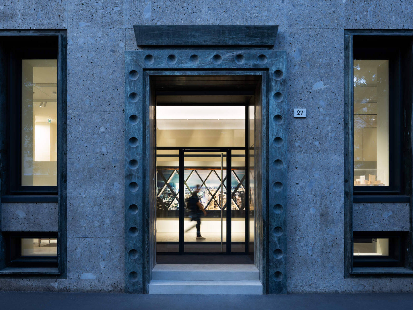 Explore RG27, ACPV ARCHITECTS' new Milan headquarters, featuring contemporary office interiors, open-plan workspaces, a central garden courtyard, architectural model archives, and a materials library.
