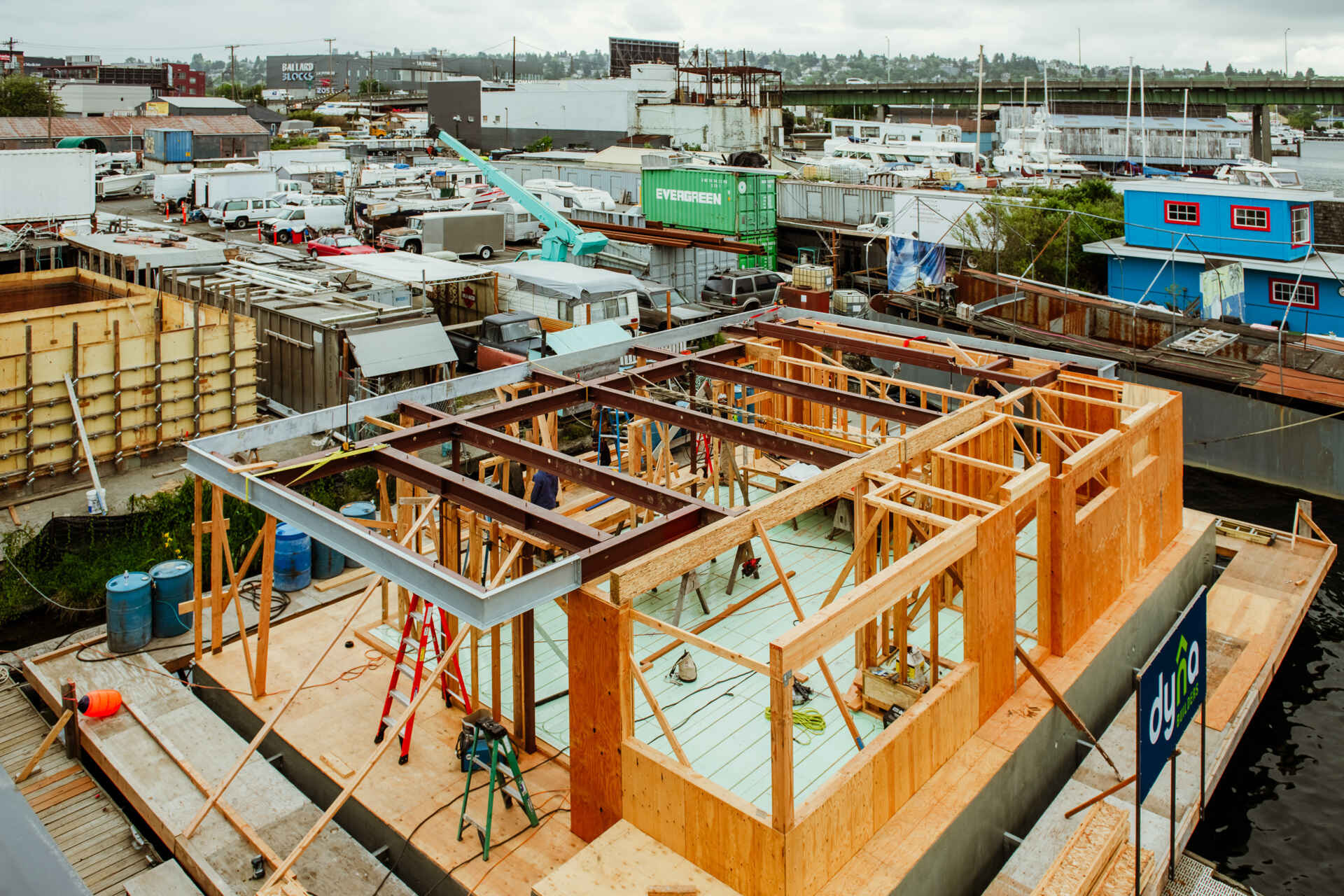 A behind-the-scenes look at the construction of Modern Beach House, a contemporary floating home on Seattle's Lake Union. Designed by Hoshide Wanzer Architects + Interiors and built by Dyna Builders at their Ballard docks, the two-story home was constructed on a new concrete float before being moved to its permanent waterfront location.