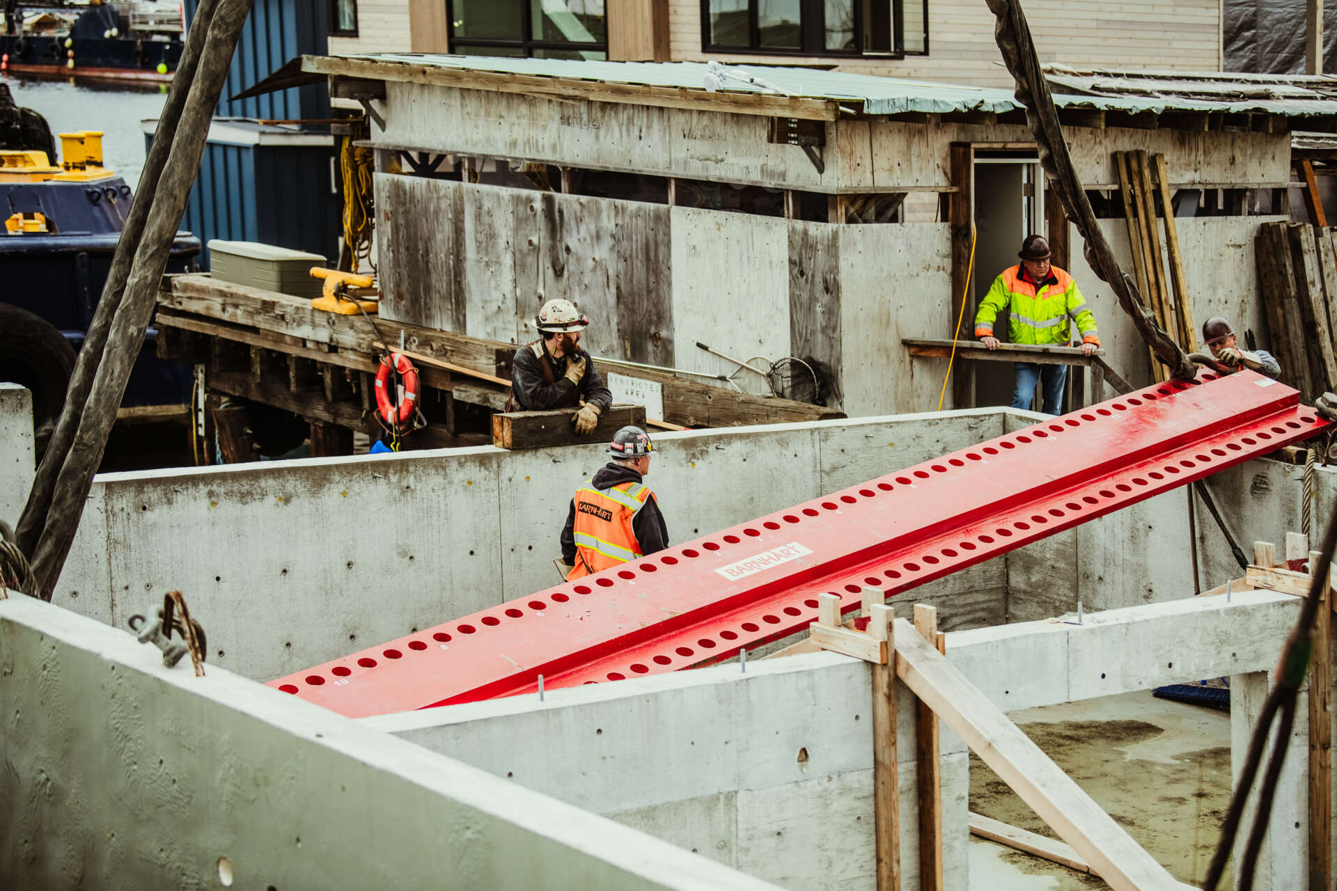 A behind-the-scenes look at the construction of Modern Beach House, a contemporary floating home on Seattle's Lake Union. Designed by Hoshide Wanzer Architects + Interiors and built by Dyna Builders at their Ballard docks, the two-story home was constructed on a new concrete float before being moved to its permanent waterfront location.