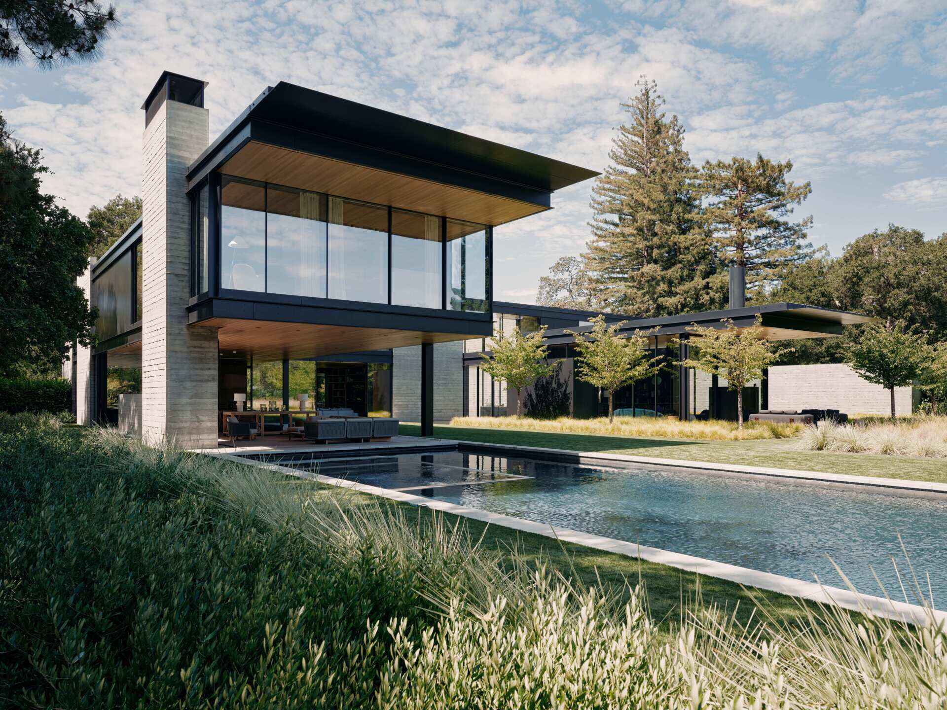 This 3.5-acre property brings contemporary architecture together with nature, outdoor living, and sustainable landscape design.