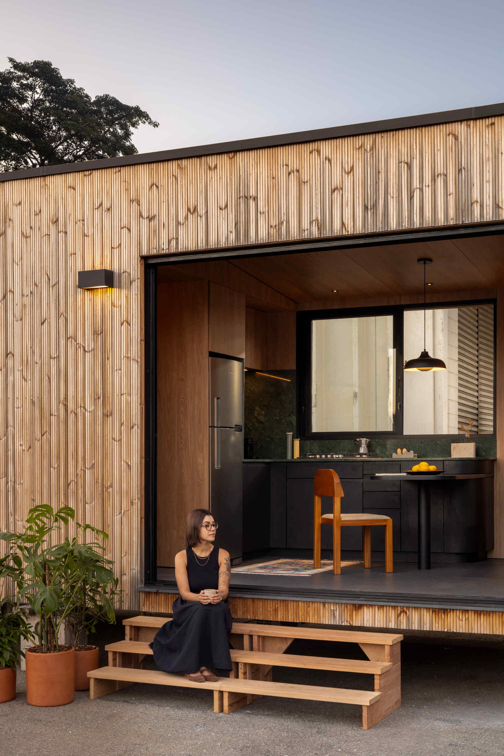 A 409 square foot prefabricated house by Muda Prefab in São Paulo, Brazil, designed around factory manufacturing, transportation, and efficient assembly.