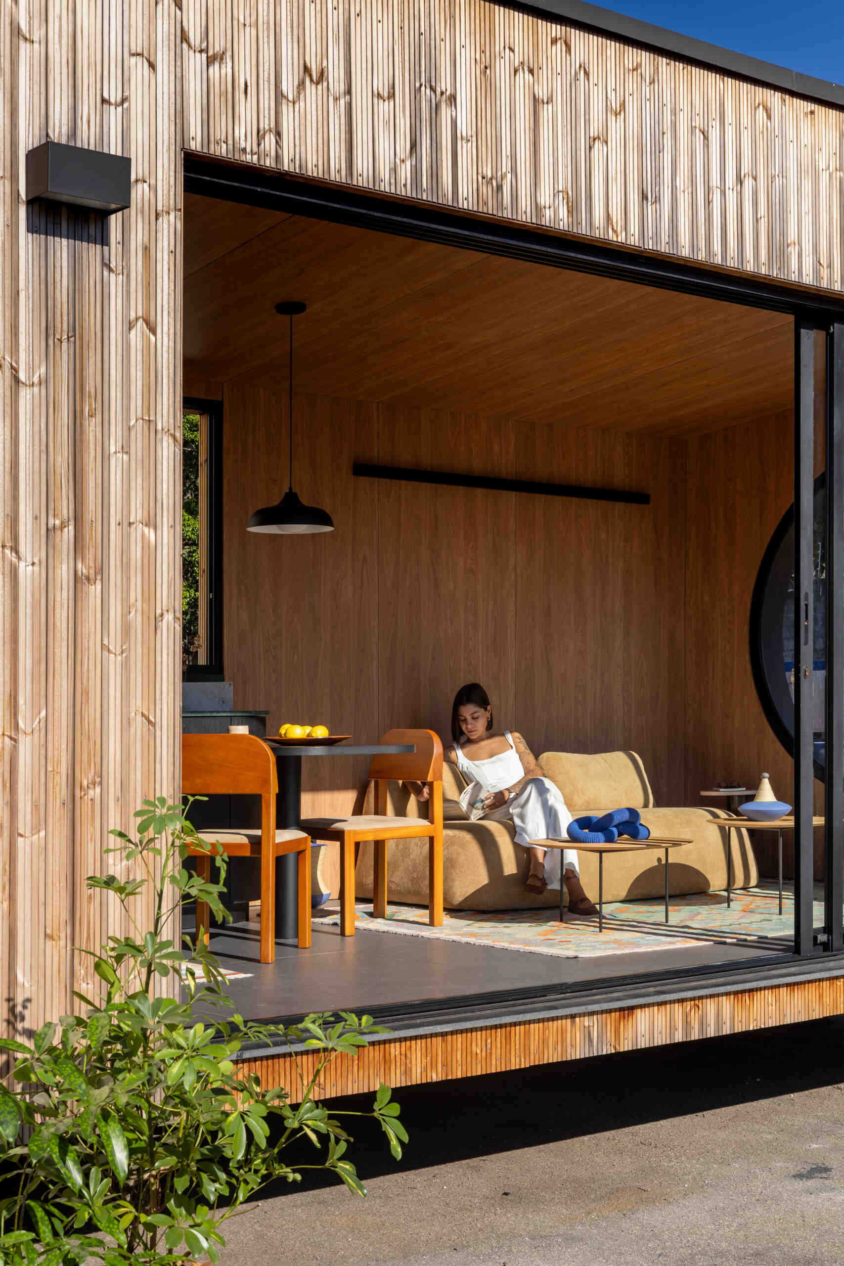 A 409 square foot prefabricated house by Muda Prefab in São Paulo, Brazil, designed around factory manufacturing, transportation, and efficient assembly.